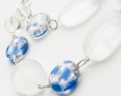 Chunky blue and clear glass statement necklace with silver chain