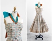 vintage 1950s dress / 50s dress / Blue and Tan Paisely Party Dress with Enormous Bow Halter Tie