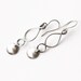 Matte silver earrings in a simple contemporary jewelry design perfect and lightweight for everyday wear - "Swirls and Flourish Earrings"