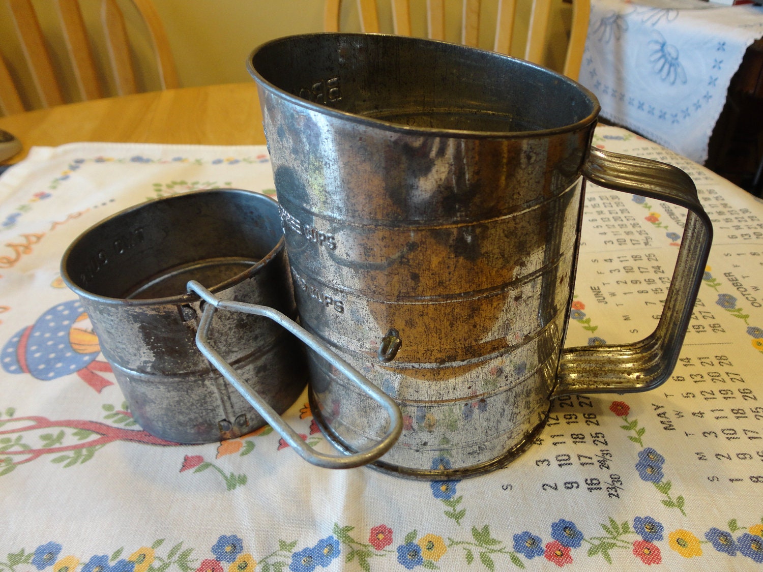 3 In 1 Vintage Flour Sifters and  1983 Kitchen Towel  Collectible Trio