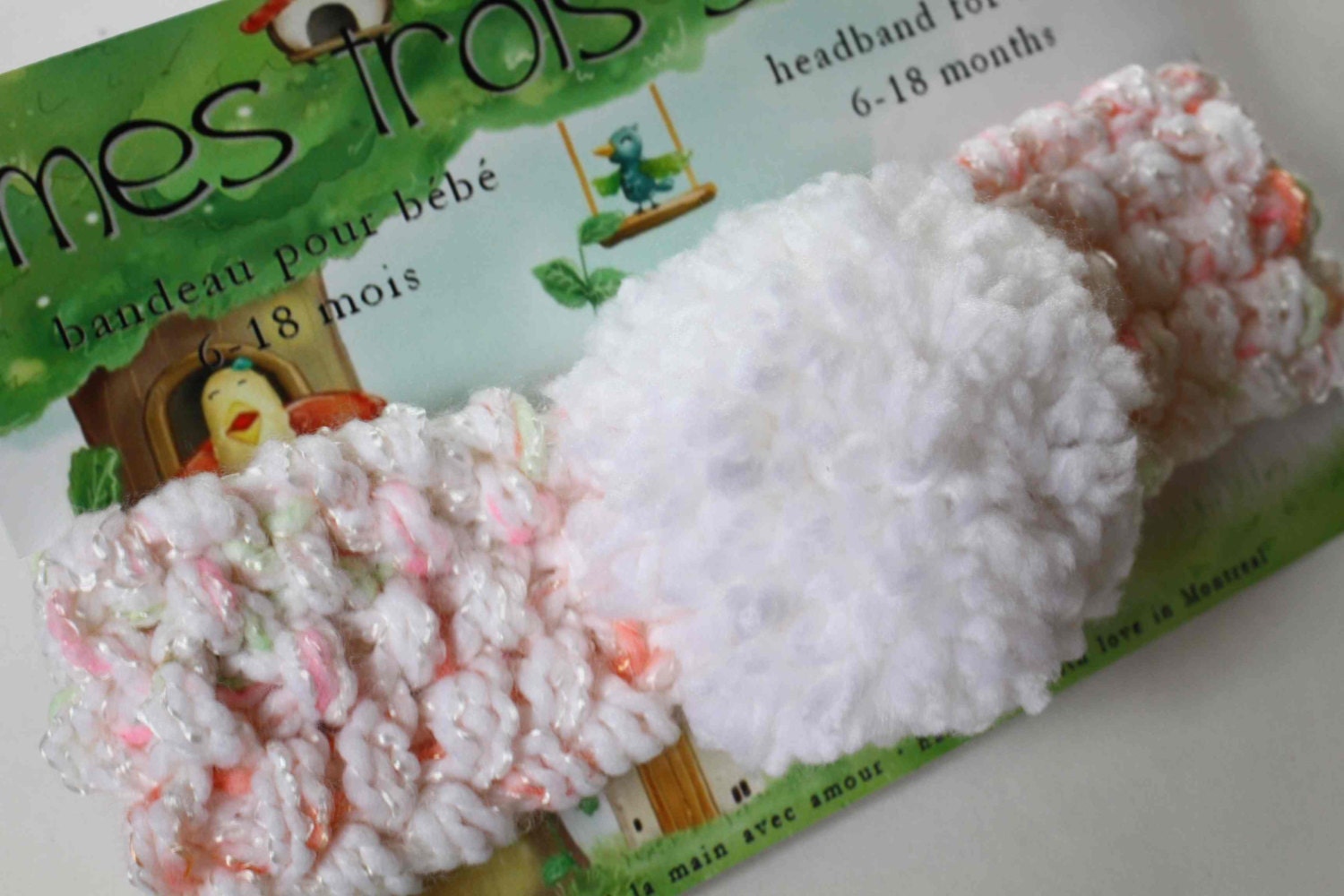 Light pink baby headband with pompom