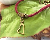Heart charm cord bracelet