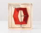 1930's Large Red Two Tone Catalin Buckle on Original Card
