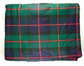 Green and red plaid wool blanket with grey fleece back for more warmth and comfort. Throw blanket for two or a twin bed blanket.