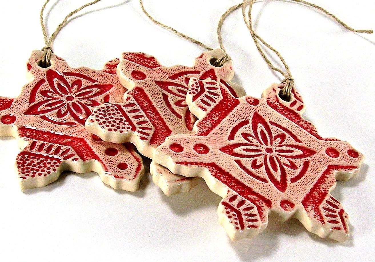 one ceramic snowflake ornament christmas ornament holiday ornament gift handmade stoneware pottery red and off white