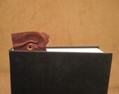 Grichels leather bookmark - textured brown with orange red eye