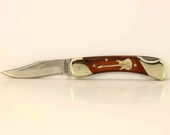 Schrade pocket knife with a custom Maple Electric guitar inlay