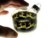 holiday ornament . glass bulb with 35mm movie filmstrip . So I Married an Axe Murderer  . OOAK . great gift for photographers