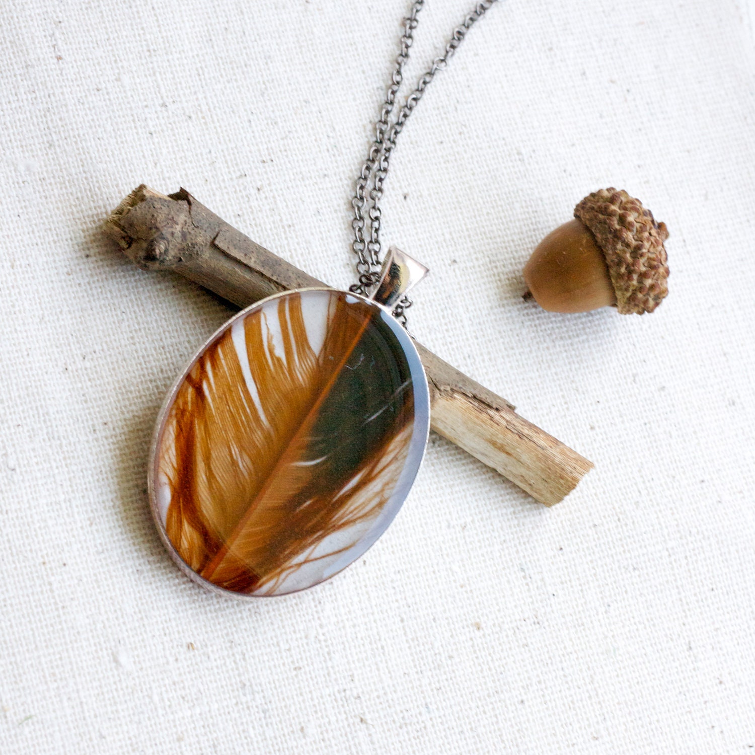real feather resin necklace black Feather pendant sheen nature black and white cream set in silver bird woodlands