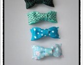 Small double bow hair clip set.  Blue and green tones