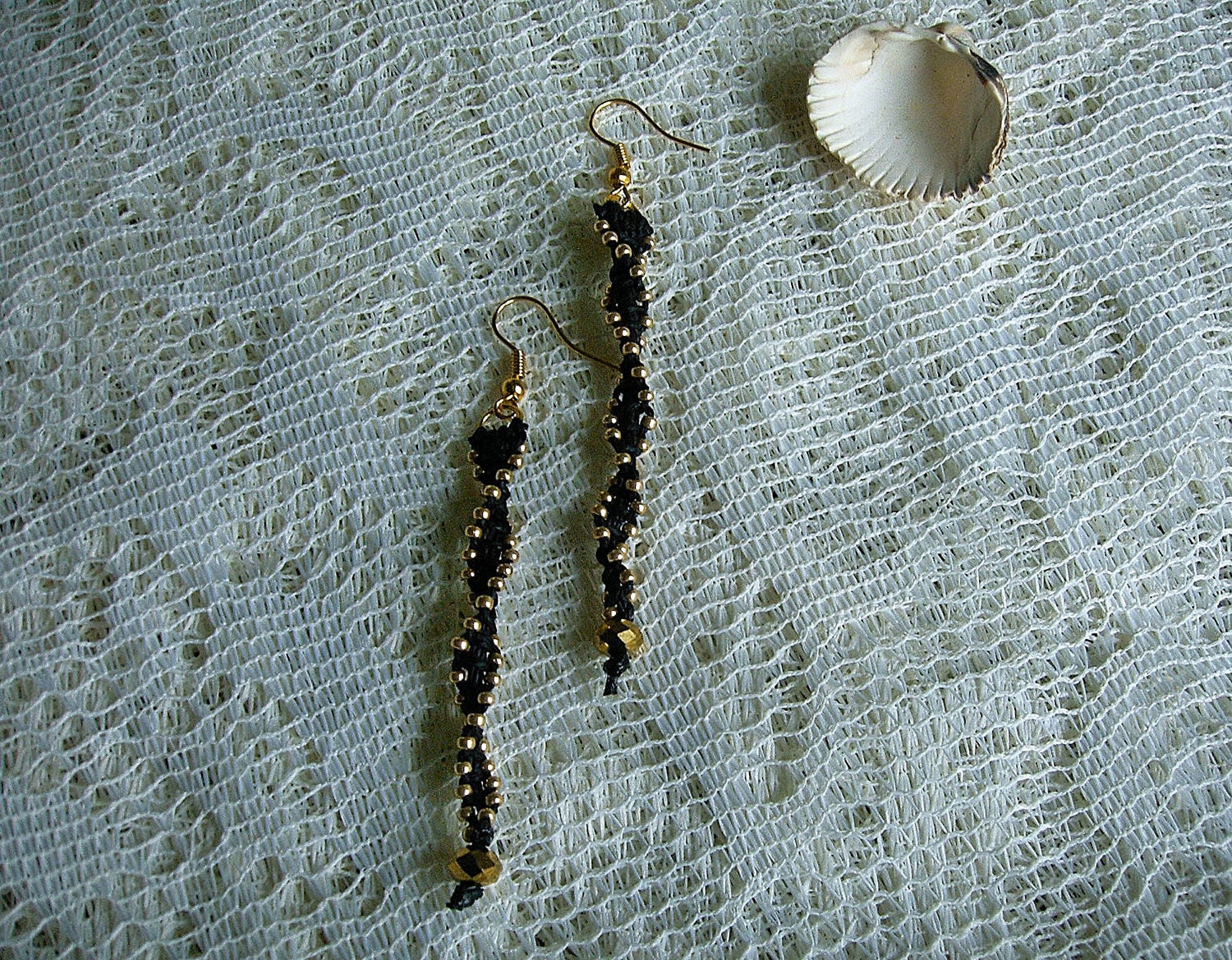 Micro macrame earrings in black and gold. Spiral earrings