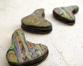 Striped strata pendant bead in polymer with lime, teal and pink accents