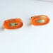 Orange lucite cufflinks with real bugs