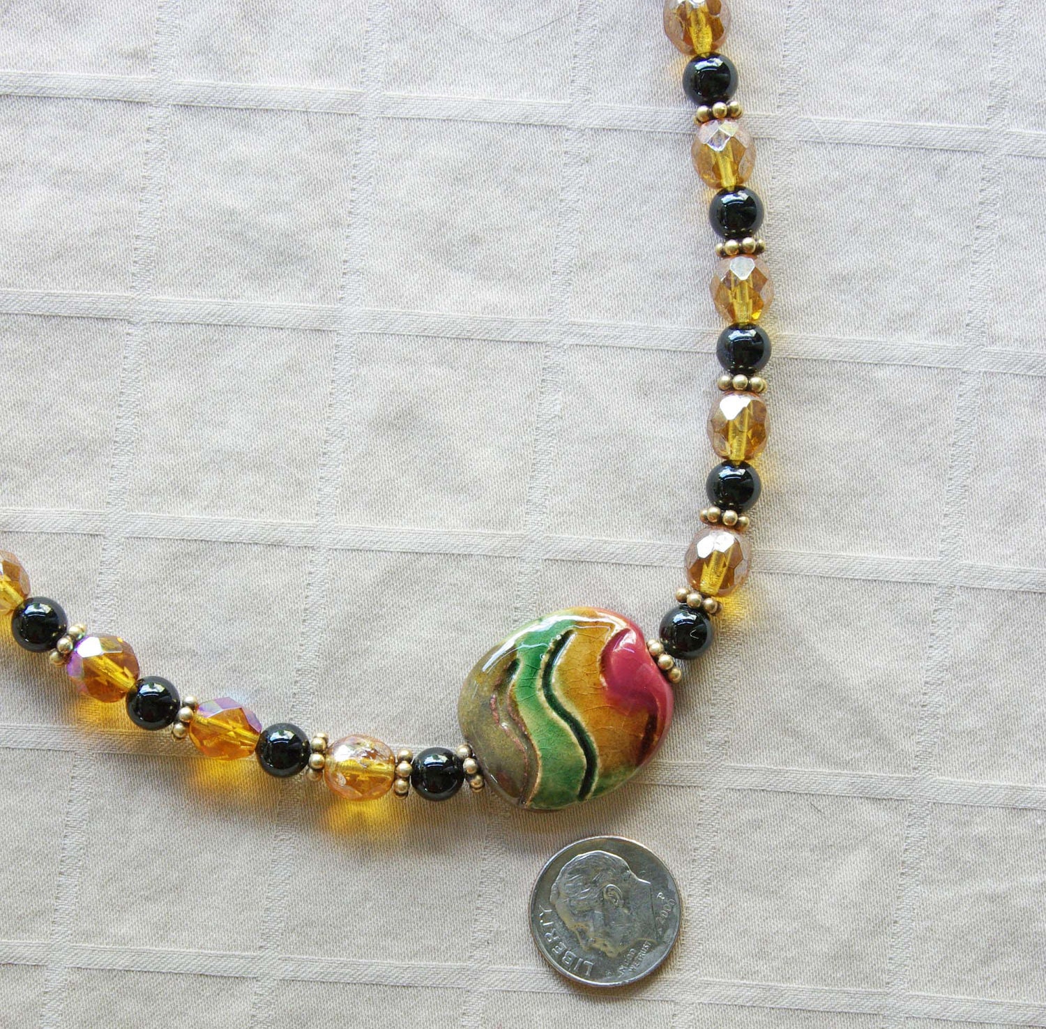 Golden Green Kazuri style bead, glass and gemstone necklace