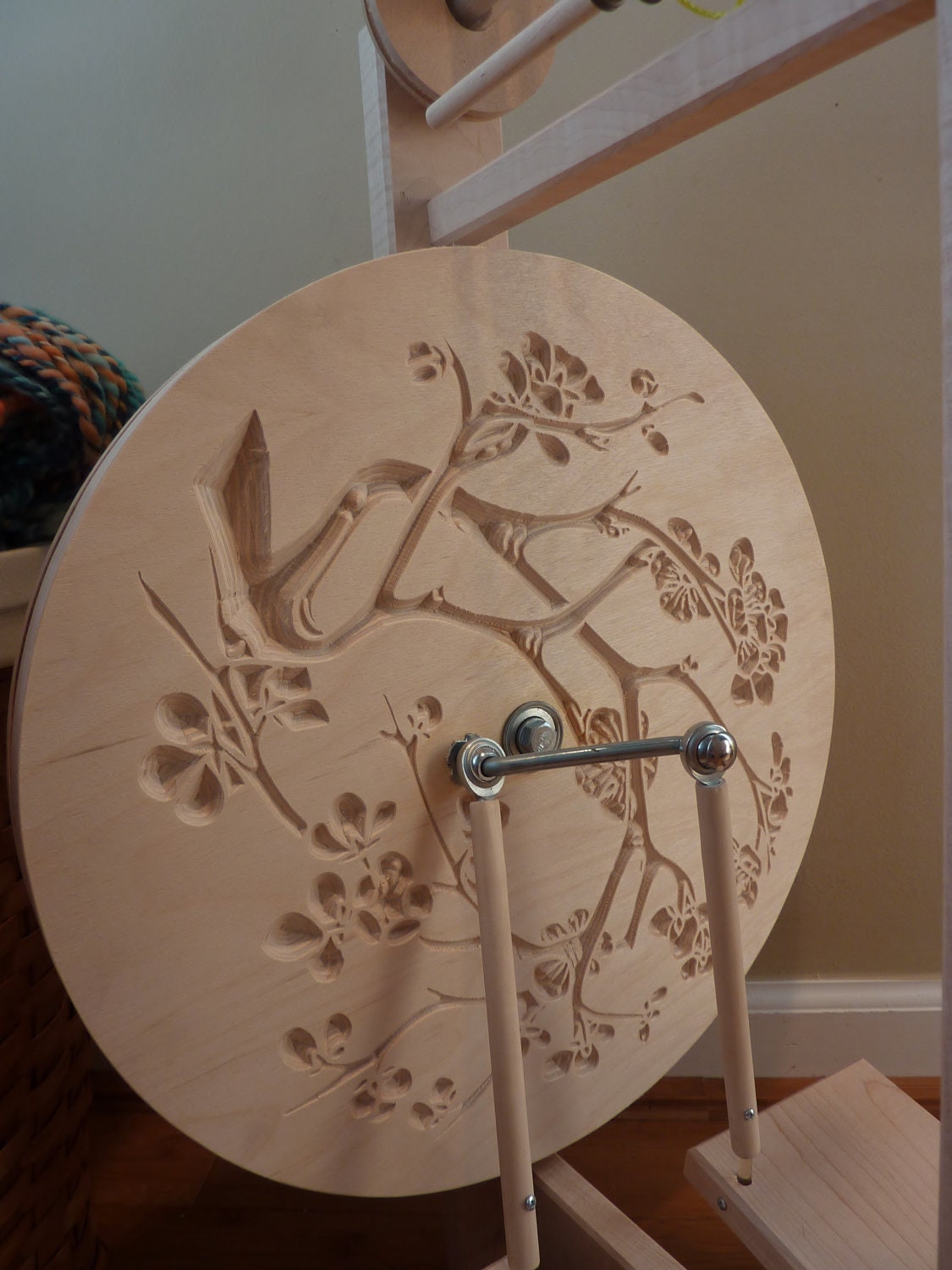 Modern Single Treadle Spinning Wheel with Cherry Blossom design - Solid Maple -  Spectacular Stella