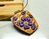 Jewelry necklace Polymer clay unique pendant fuchsia flower on gold surface handmade by Artefyk