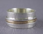Personalized hammered spinner ring made from sterling silver and solid 10k gold