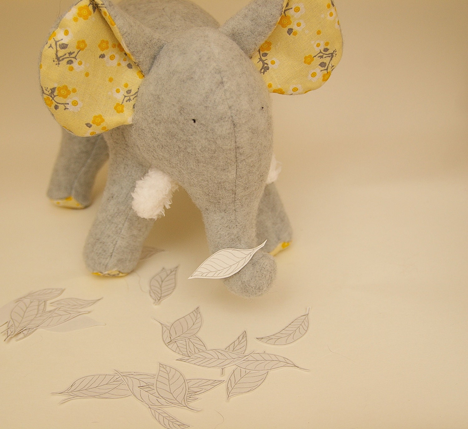 Blossom Grey- Plush Gray Fleece Elephant with yellow and grey flowers on her tummy and soft chenille tusks