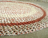 Recycled rag rug. Handmade crochet oval rag rug. Made with vintge, upcycled fabric. Brick, orange. - GladRaggz