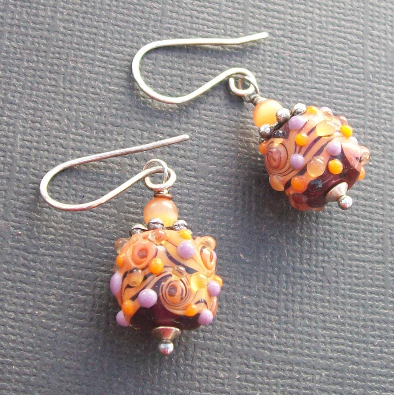 lampwork earrings orange and lavender bumpy bead swirls- bollywood