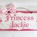 Custom "Princess" sign in hot pink, light pink and white.