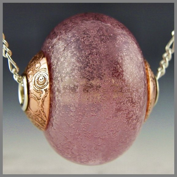 a large transparent purple hollow handmade lampwork bead, silver cored and capped that will fit big hole European style bracelets - Aura