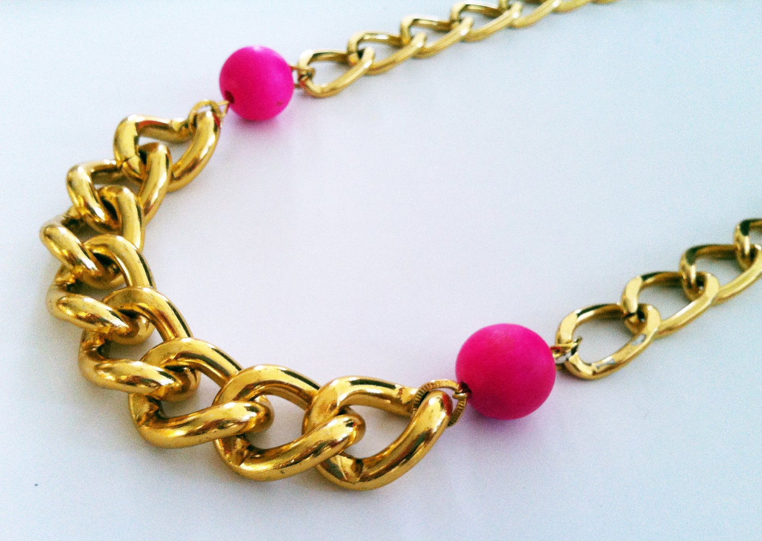 Guapa: chunky antique style gold chain statement necklace with hot pink beads. Limited edition.