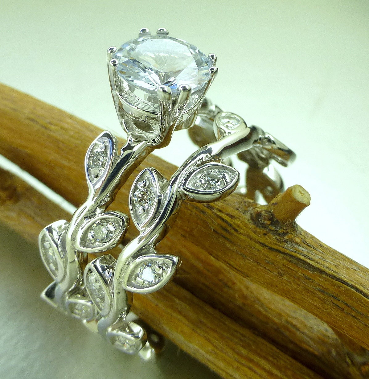 Leaf diamond engagement ring set.  14k gold, white sapphire center