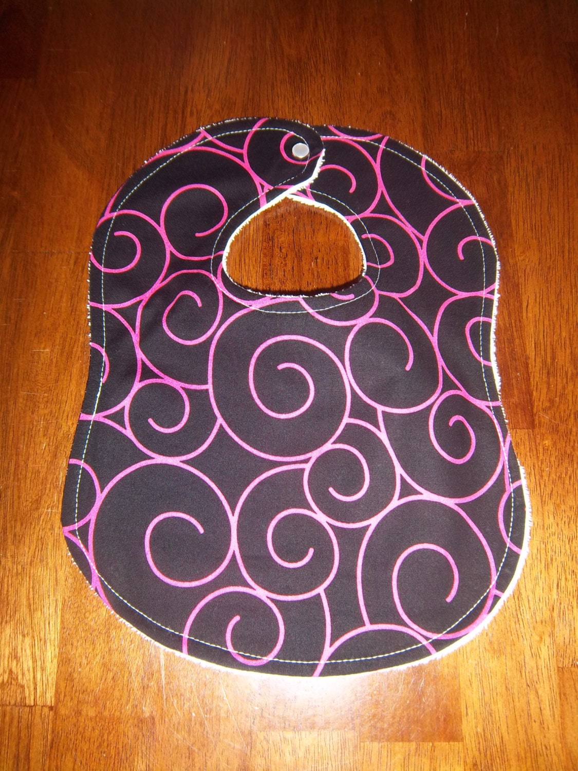 Black with Hot Pink Swirls Bib