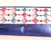 SPECIAL OFFER: Metallic blue leather clutch bag with folded white & colourful discs. Magenta pink, pearlescent pink, turquoise and silver