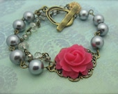 ELECTRIC POP - Silver Grey Pearls With A Fuchsia Rose Cabochon Secured To A Stunning Antiqued Brass Filigree