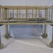 vintage wood doll bed wood wheels red white and blue ticking mattress