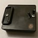 Recycled Video Arcade Twenty-Five Cent Coin-Drop Belt Buckle... that lights up