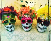 Sugar Skull Sculpture featuring Purple and Orange flowers