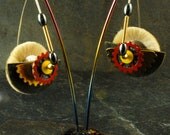 Clock Works Kinetic Red & Yellow Dangles