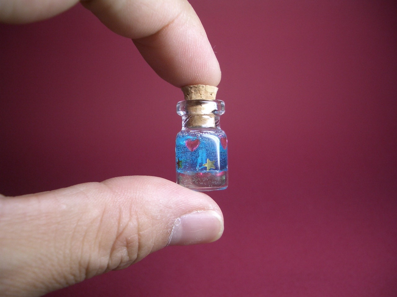 A couple with Lovely hearts and stars in a tiny bottle
