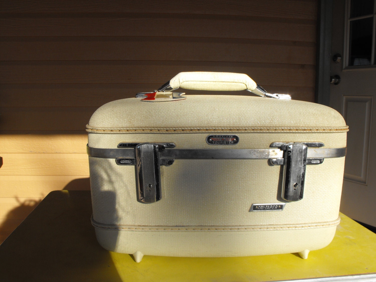 American Tourister carry-on case
