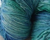 Blue and green hand dyed Merino silk single ply worsted yarn, Nessie