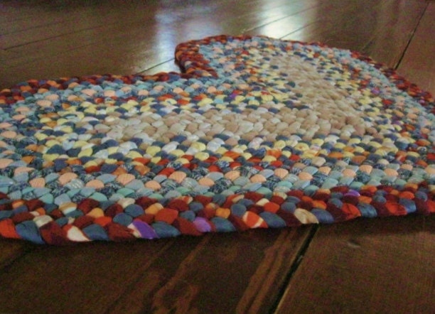 Handmade Braided Heart Rug in Orange and Blue from recycled cotton
