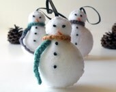 Three felt snowmen ornaments with handmade finger crocheted scarves