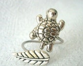 silver turtle ring with a leaf, wrap open style