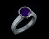 sterling silver solitaire ring with an amazingly brilliant amythyst