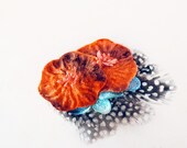 orange velvet flower hair clip with black white feather and turquoise: quinn