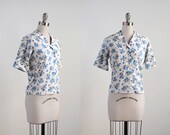 60's vintage cotton blouse. 1960's white top. print. sleeve cuffs. collared. blue floral blouse 60.