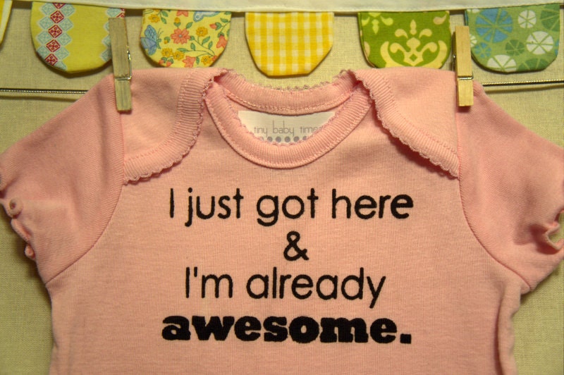 I just got here & I'm already awesome  --- pink onesie, size 0 to 3 months.