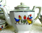 Vintage Child's Tea Set, Dutch Girl with Wooden Shoes, tiptoe through the tulips with a bluebird, Made In Japan