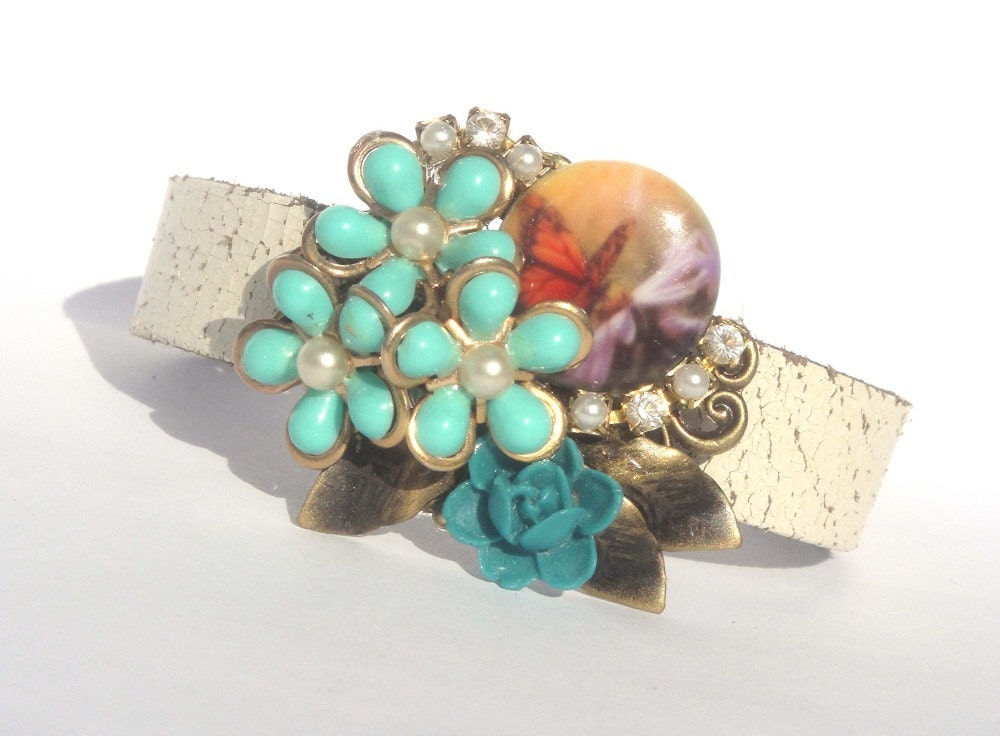 This cute shabby chic pastel mint vintage collage bracelet is made with a beautiful vintage mint green flower cluster earring with tiny little pearls.