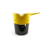 Bright yellow Michael Lax Copco sauce warmer - vintage midcentury warming stand
