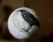 Black raven painted newsprint  bauble