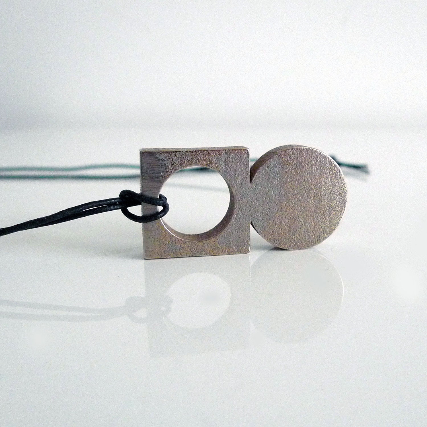 Circle on Square Stainless Steel Pendant